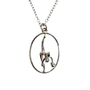 KOMKOV brooch green gymnast with hoop sitting down (Копировать)
